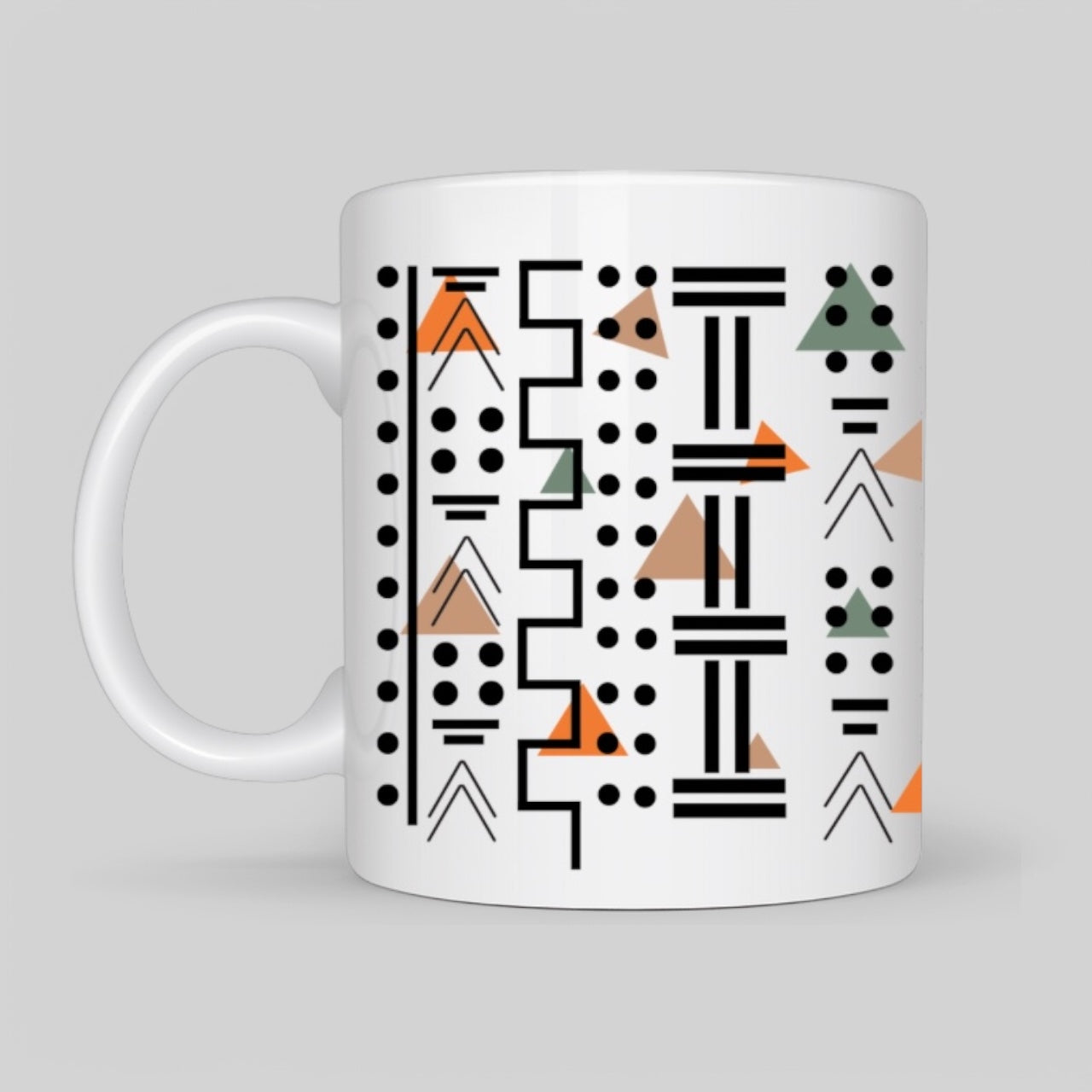 White ceramic mug with modern geometric abstract design in earthy tones, featuring circles, lines, and minimalist patterns for a contemporary aesthetic