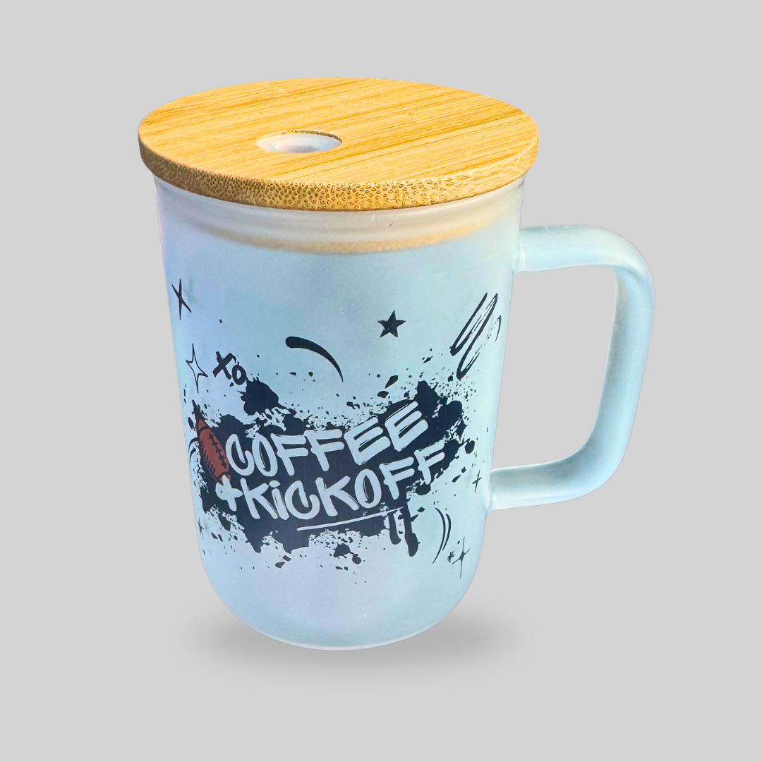 16oz frosted glass mug with bamboo lid and glass straw, featuring bold Coffee + Kickoff football design — perfect for hot or iced drinks.