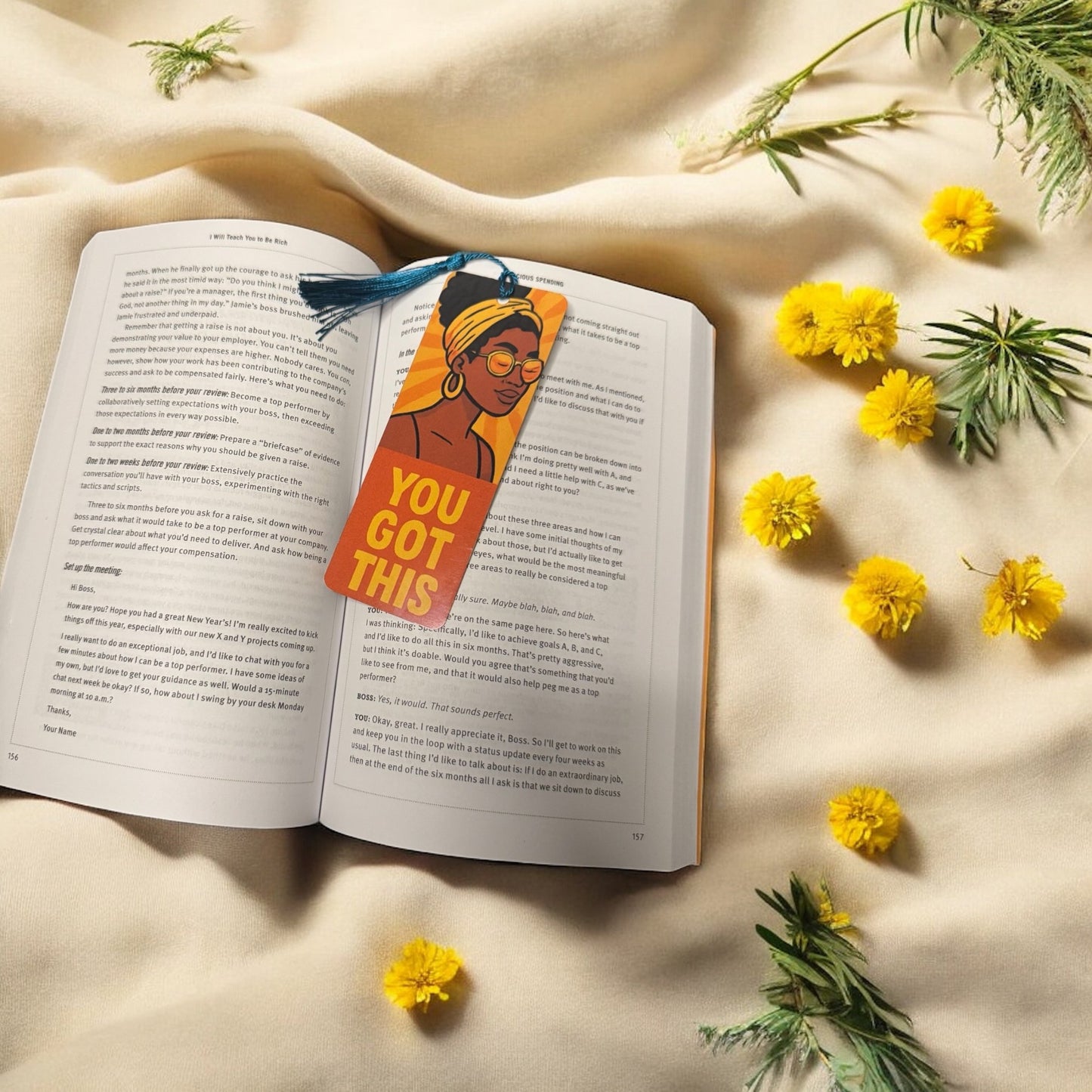You Got This affirmation bookmark in open book with yellow summer flowers on beige fabric background – Roomshion summer lifestyle accessory.