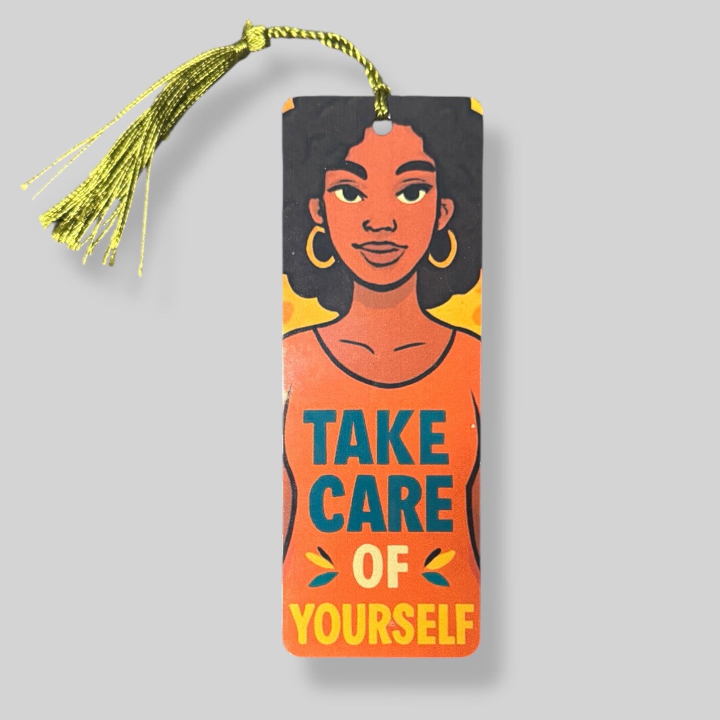 Woman in orange top with calm expression and background leaves—perfect for mental health and affirmation themes.