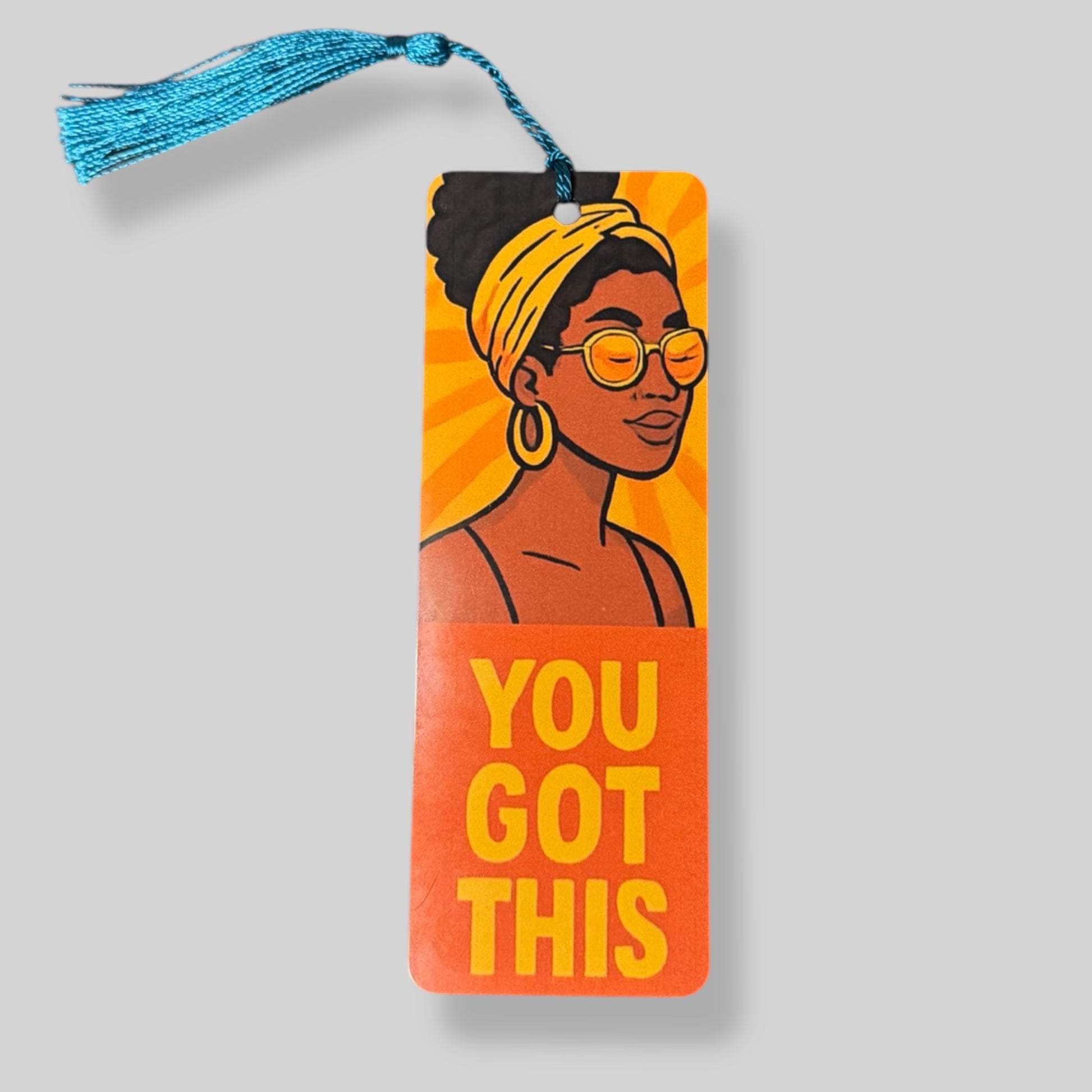 Confident woman with sunglasses and yellow headband on a bright background with motivational text.